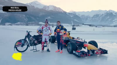 Max Verstappen driving a Formula 1 car in the snow